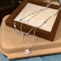 Double Strand Pearl and Star Pendant Necklace Statement Jewelry Design view 2