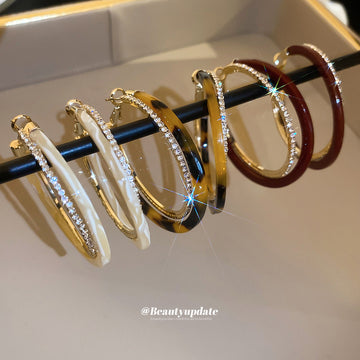 Two Tone Oval Hoop Earrings With Crystal Trim and Colored Inlays