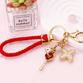Key Flower Butterfly and Heart Clover Charm Keychains with Wrist Loops view 2