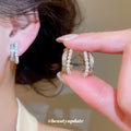 Pearl and Crystal Double Hoop Clip Earrings in Gold and Silver Tones view 1