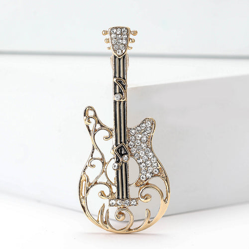 Gold guitar brooch close-up product view