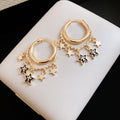 Gold Star Charm Huggie Hoop Earrings Statement Jewelry Design view 6
