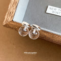 Clear Round Drop Earrings with Sculpted Silver Tone Studs view 3
