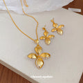 Gold Four-Petal Flower Necklace and Matching Earrings view 4