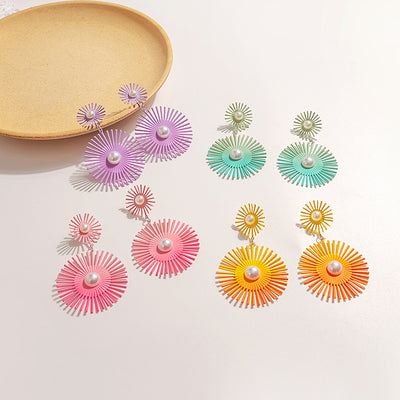 Primary supplied view of double sunburst pearl-look dangle earrings
