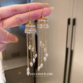 Gold Crystal Dome Chain Tassel Hook Earrings Polished Metal Jewelry view 1