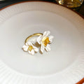 Gold Tone Open Ring With Two White Flowers And Yellow Square Crystal view 6