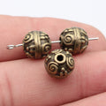 Swirl Pattern Round Spacer Beads in Two Antique Finishes view 3