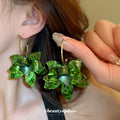 Resin Flower Hoop Earrings In White Orange And Green view 2