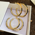 Tortoiseshell Accent Double Hoop Earrings in Gold Tone view 2