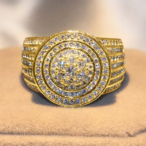 Front face gold round pave ring on beige display pad