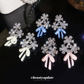 Crystal Flower Stud Earrings With Pastel Bow Drops view 2