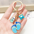 Eight Blue and Pink Baby Outfit Footprint Keychain Designs view 1