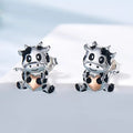 Black and White Cow Stud Earrings with Peach Accents view 2