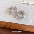 Silver Tone Polished Interlocking Double Hoop Earrings view 4
