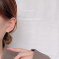 Gold Tone Rope Knot Flower Frame Clear Stone Stud Earrings view 2