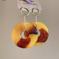 Resin Circle and Teardrop Earrings in Warm Yellow Tones view 6