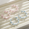 Pearlescent Color Twisted Silver Tone Hoop Earrings view 2