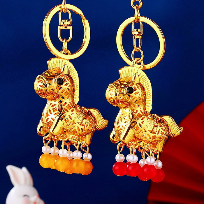 Illuminated Rocking Horse Keychains With Red or Yellow Bead Tassels