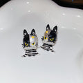 Black and White Cat Stud Earrings with Striped Bodies and Gold Details view 6