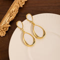 White Double Teardrop Gold Tone Long Dangle Earrings view 3