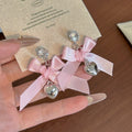Pink Ribbon Bow Silver Bell Long Dangle Stud Earrings view 2