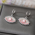 Gold and Silver Tone Crystal Pearl Evil Eye Huggie Earrings view 8
