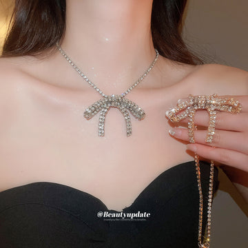 Crystal Bow Pendant Necklaces in Gold and Silver Tones