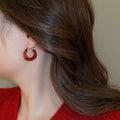 Deep Red Resin and Gold Tone Rounded Huggie Hoop Earrings view 4