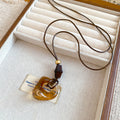 Brown Resin Geometric Pendant Cord Necklaces in Six Designs view 7