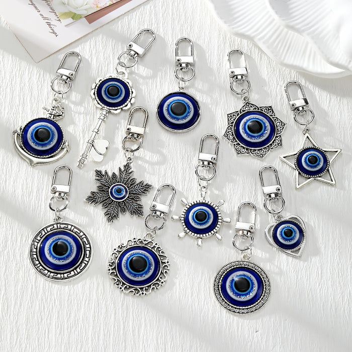 Silver Tone Blue Evil Eye Lobster-Clasp Charms in Eleven Designs and Set