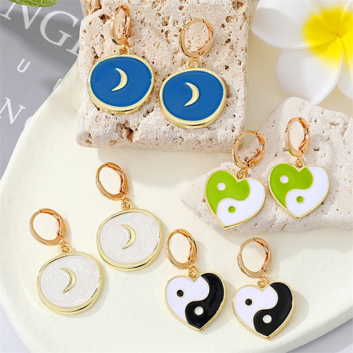 Gold Tone Crescent Disc and Yin Yang Heart Huggie Earrings
