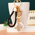 Jeweled Four-Leaf Clover Keychain with White Enamel Disc view 3