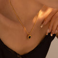 Gold Heart Black Acrylic Center Stud Earrings And Necklace view 3