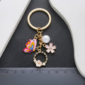 Pink Butterfly Pearl and Open Flower Enamel Charm Keychain view 4