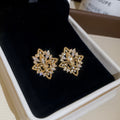 Diamond Shape Floral Crystal Stud Earrings in Silver or Gold view 1