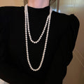 Long White Pearl Look Beaded Strand Necklace with Metal Tone Details view 3