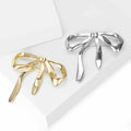 Sculpted Metal Bow Brooch In Gold And Silver Tone Decorative Lapel Pin view 3