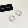 Silver Huggie Hoop Earrings Black Heart Enamel Accents view 3