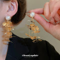 Metal Petal Long Drop Stud Earrings In Gold And Silver view 3