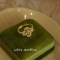 Gold Tone Open Adjustable Clover Knot Ring Pavé Border view 3