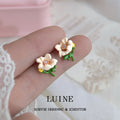 White Flower Green Stem And Pink Center Stud Earrings For Women view 3