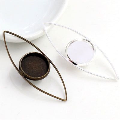 Image 5 showing marquise open-frame pendant bezels with round inner tray in the pictured colors and forms