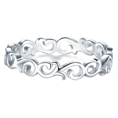 Silver openwork scroll vine band ring close front on white