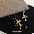 Crystal Cross and Star Pendant Necklaces in Two Metals view 2