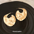 Sculpted Wavy Disc Stud Earrings in Gold and Silver Tone view 3