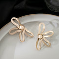 Openwork Flower Stud Earrings Gold Silver Metal Center view 3