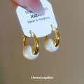 Gold Polished Hoop Earrings with Large White Pearl Drops view 2