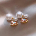 Asymmetric Gold Tone Rocking Horse And Pearl Stud Earrings view 7