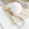 Faux Fur Pom-Pom Keychain with Faux Pearl Wristlet Strap view 11